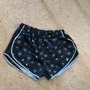 Nike dri fit athletic shorts floral navy pattern